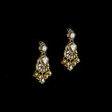 Elegant fusion-style necklace and earring pair featuring uncut diamond Polki, sparkling round diamonds, and subtle red enamel accents—perfectly blending traditional charm with modern sophistication for a standout look.(WDN1214)