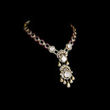 Elegant fusion-style necklace and earring pair featuring uncut diamond Polki, sparkling round diamonds, and subtle red enamel accents—perfectly blending traditional charm with modern sophistication for a standout look.(WDN1214)