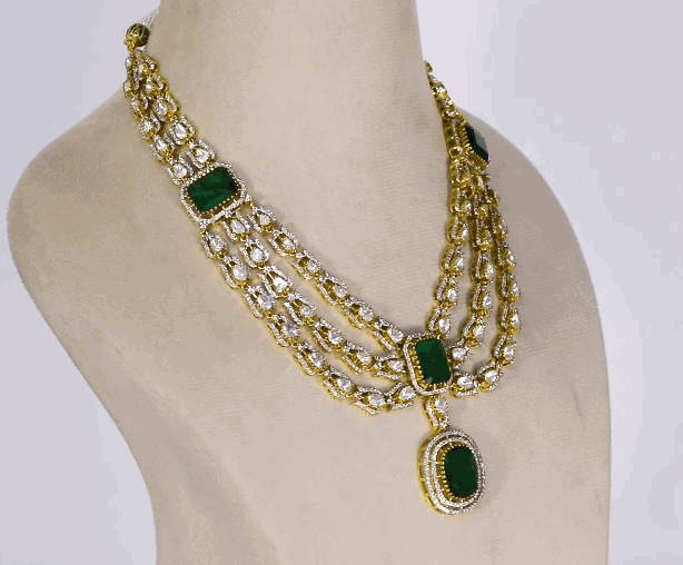 Elegant three-line fusion necklace featuring sparkling round diamonds and uncut diamond Polki, centered with a stunning octagon emerald—perfectly blending traditional artistry with modern sophistication for a captivating, timeless look.(WDN1218)