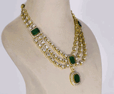 Elegant three-line fusion necklace featuring sparkling round diamonds and uncut diamond Polki, centered with a stunning octagon emerald—perfectly blending traditional artistry with modern sophistication for a captivating, timeless look.(WDN1218)