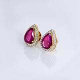 A timeless pairing of vivid rubies and dazzling diamonds in a graceful pear silhouette.(WDN1261)