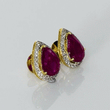 A timeless pairing of vivid rubies and dazzling diamonds in a graceful pear silhouette.(WDN1261)