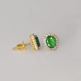 Rich oval emeralds surrounded by sparkling round diamonds, a perfect blend of beauty and sophistication.(WDN1282)
