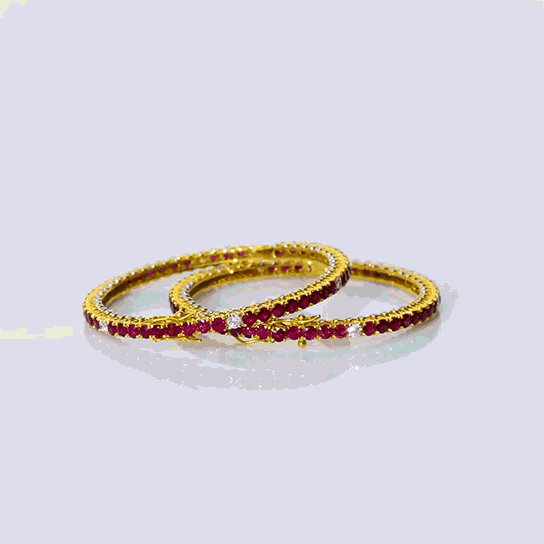 Embrace the elegant allure of our ruby and diamond bangle pair  - (WDN1088)