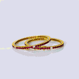 Embrace the elegant allure of our ruby and diamond bangle pair  - (WDN1088)