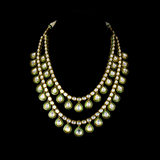 Necklace with 2 line of diamond polki and earring pair in 18k gold with green talf.Introducing our exquisite two line big Polki necklace set, a true statement piece that exudes elegance and sophistication. - KMNE3199