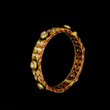 Kada pair with green churi meena in 18k gold and uncut diamond.Green Churi Meena Bangle is a beautiful and traditional piece of jewelry that adds a touch of elegance to any outfit. - KMB0538